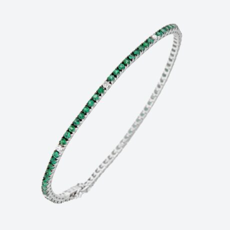 Pulsera D&D rivière con esmeraldas (1.90ct) y brillantes (0.21ct, G, VS) en oro blanco 8g.Medida: 18cm