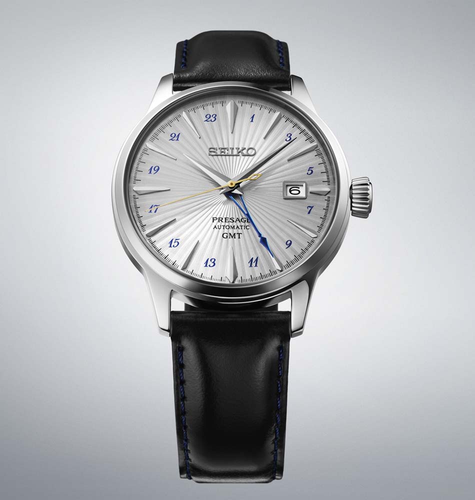El Seiko Presage Cocktail Time SSK049 combina la elegancia clásica de la colección Presage con la funcionalidad de un reloj GMT, inspirado en la sofisticación de los cócteles japoneses. Su diseño refinado y sus acabados cuidados lo convierten en una pieza ideal tanto para el uso diario como para ocasiones especiales. En su interior incorpora el calibre automático 4R34, con capacidad de carga manual, 41 horas de reserva de marcha y función GMT, que permite visualizar un segundo huso horario mediante una aguja de 24 horas. Además, dispone de indicación de fecha y función de parada del segundero para un ajuste preciso. La caja de acero inoxidable de 40,5 mm se combina con una elegante correa de piel de vaca, mientras que el cristal Hardlex en forma de caja aporta un marcado aire vintage. El conjunto se completa con un fondo transparente roscado, que permite admirar el movimiento automático, y una resistencia al agua de 5 bares (50 metros). En resumen, este Seiko Presage Cocktail Time SSK049 une la elegancia de la relojería japonesa con la practicidad de un reloj GMT, ofreciendo una pieza distinguida para quienes buscan estilo y funcionalidad en el día a día. Descubre toda nuestra colección de los relojes Seiko Presage. Referencia Seiko: SSK049