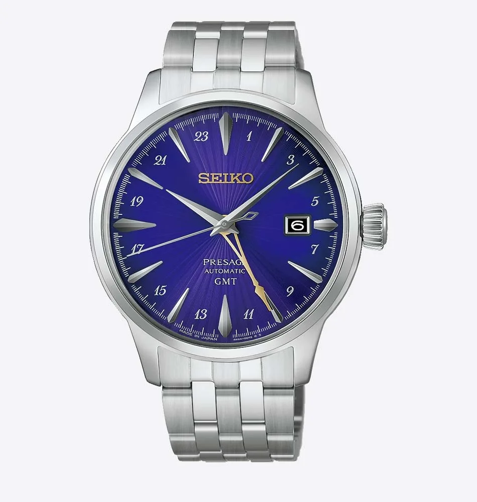 El Seiko Presage Cocktail Time Seiko 145th Anniversary Limited Edition HCB006 celebra el 145.º aniversario de Seiko con una edición limitada a 6.000 piezas. Su esfera púrpura con patrón radial, característica de la colección Cocktail Time, se inspira en el cóctel «Edo Murasaki», creado en colaboración con Hisashi Kishi, propietario de STAR BAR. Esta tonalidad evoca el patrimonio cultural de Tokio y su evolución a lo largo del tiempo, mientras que el logotipo y la aguja GMT en tono dorado aportan un contraste elegante y simbolizan un futuro brillante. En su interior incorpora el calibre automático 4R34, un movimiento mecánico con capacidad de carga manual, 24 rubíes y una reserva de marcha aproximada de 41 horas. La aguja de 24 horas permite consultar un segundo huso horario, mientras que la función de parada del segundero facilita un ajuste preciso de la hora. También dispone de visualización de la fecha. La caja de acero inoxidable de 40,5 mm incorpora un cristal Hardlex con forma de caja y un fondo transparente y roscado que permite contemplar el movimiento mecánico. El conjunto se completa con un brazalete de acero inoxidable y un cierre desplegable con botón de apertura. Su resistencia al agua de 5 bares y su resistencia magnética de 4.800 A/m completan sus características técnicas. El Seiko Presage Cocktail Time Seiko 145th Anniversary Limited Edition HCB006 combina la tradición relojera japonesa con una esfera de inspiración coctelera y la funcionalidad GMT, en una edición conmemorativa cuyo fondo de caja incorpora la inscripción «LIMITED EDITION». Descubre toda nuestra colección de relojes Seiko. Referencia Seiko: HCB006 Referencia interna: R-SEI-PRE-0020